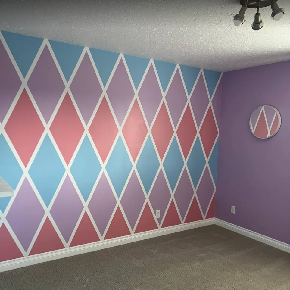 Custom geometric diamond pattern accent wall - expert interior painting craftsmanship
